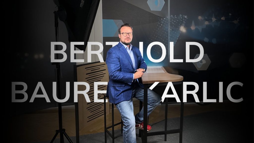 Berthold sitting on chair in the Venionaire Studio