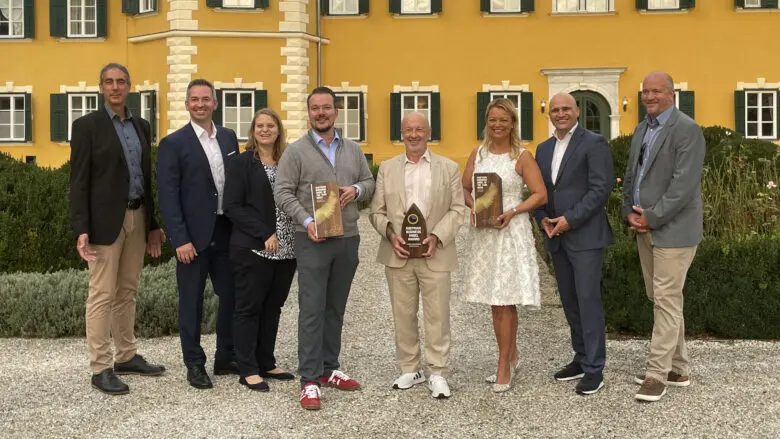 Seven people posing for the camera